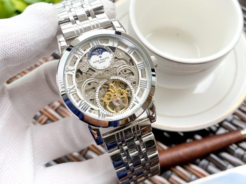 Patek Philippe men's luxury watches feature a classic design with a large flywheel, showcasing exquisite craftsmanship and exuding a noble aura